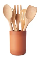 Wooden cooking utensils in pot